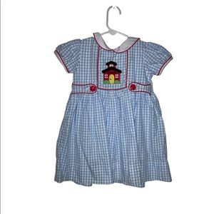 Back to school dress with sweet school house appliqué!